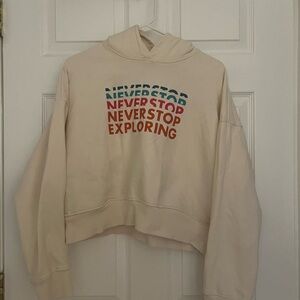 The North Face Cream Hoodie with Multicolor Text